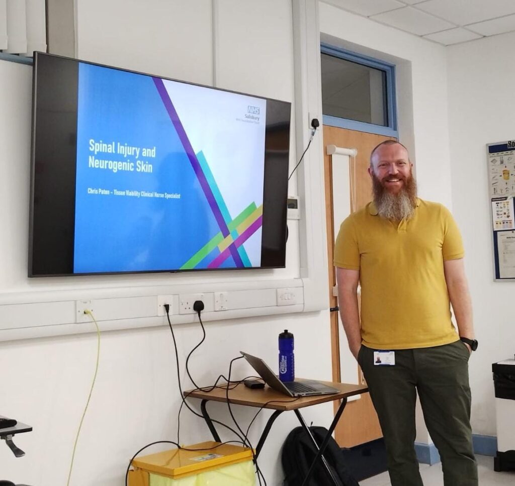 Image of team member about to deliver education